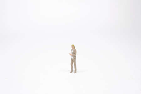 the mini of business lady figure on the boardの写真素材