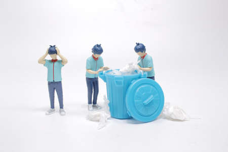 the figure of face the rubbish problemの写真素材