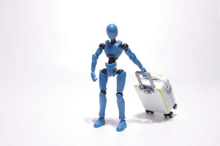 the scale of figure Man travel with suitcaseの写真素材
