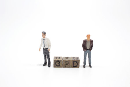 GDP word written on iron block, with the figure.の写真素材