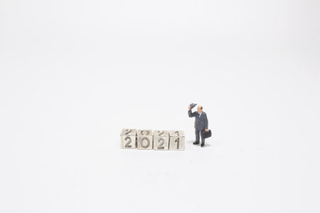 the figure with iron cubes on white backgroundの写真素材