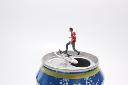 the mini figure play the Skateboard on canの写真素材