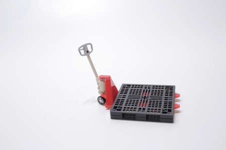 red pallet truck, pallet truck with empty pallet,の写真素材