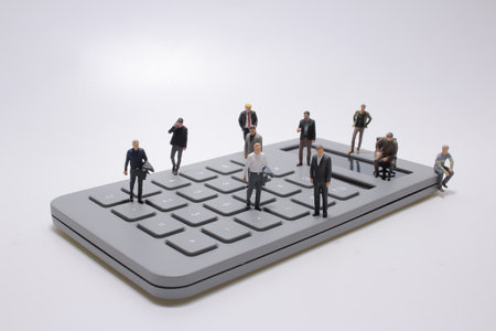 Business figurines placed on calculate, the Business idea