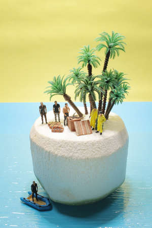 mini Man buying guns of a criminal at Young coconutの写真素材