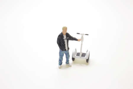the mini figure with the Dual Wheel Self Balancing Electric Skateboard.の写真素材