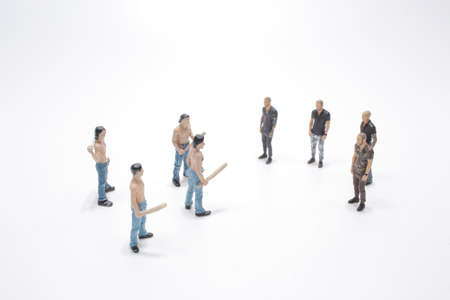 the group of mini men Guy holding a batの写真素材