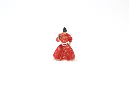 the mini figure of the Sumo referee on whiteの写真素材
