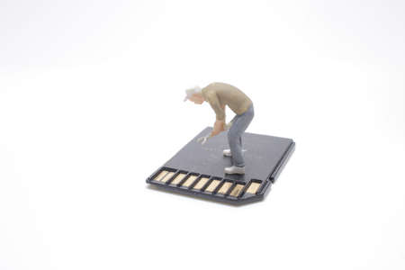 A Mini Worker Working On SD Card.