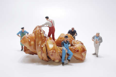 Miniature figure concept of construction worker, Food, Business concept.