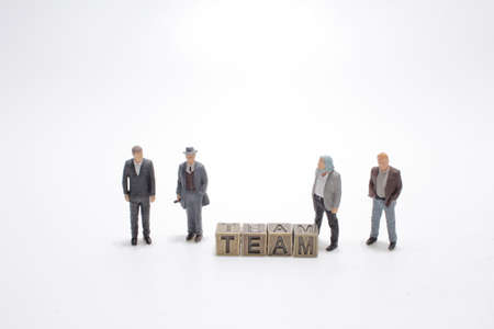 a cube with Figure Concept: Strength, Success Through Teamworkの写真素材