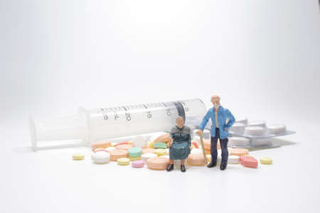 a Mini ederly with the pill, the Health problemの写真素材
