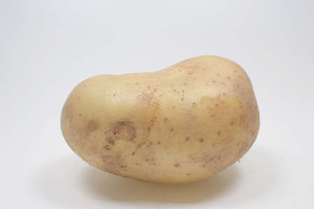 the photo of Potato tubers on a white backgroundの写真素材