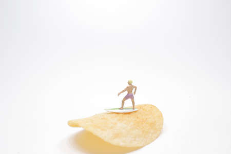the mini of Surfer, Surfing on potato chipの写真素材