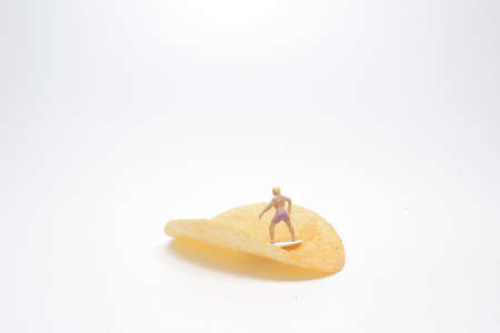 the mini of Surfer, Surfing on potato chipの写真素材