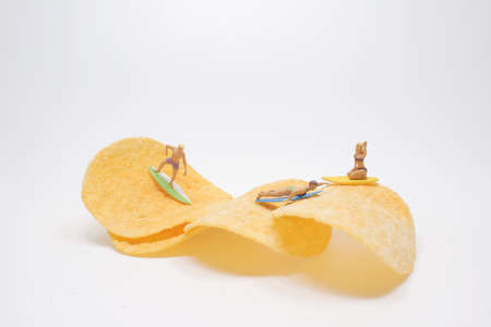 the mini of Surfer, Surfing on potato chip