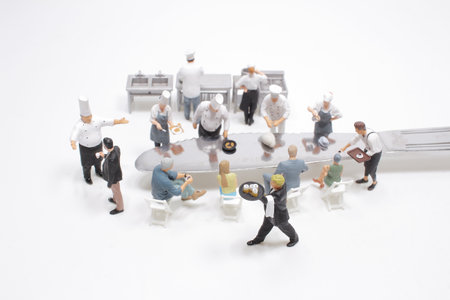 the mini figure Chef cooking Teppanyaki on kinfeの写真素材
