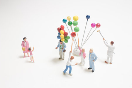 the mini figure family and children with colorful ballons