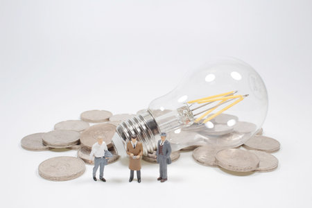 a Business idea, a light bulb with coins.の写真素材