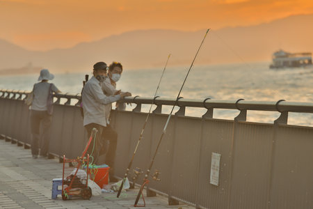22 July 2021 fishing at Central and Western District Promenade, Sheung Wan Sectionの写真素材