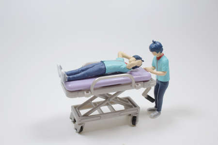 the mini of figure Patient In Hospital Bed