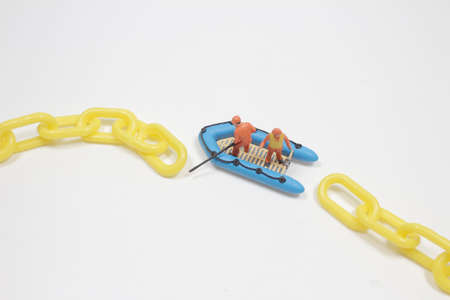 the mini figure try to connect the chain lengthの写真素材