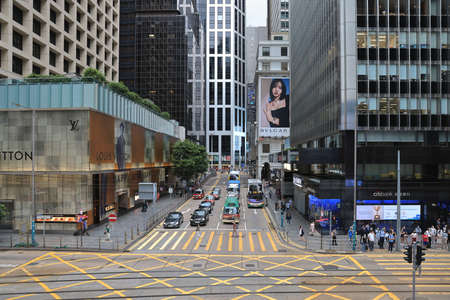 13 Aug 2021  Pedestrians cross Pedder Street by busy in Central.