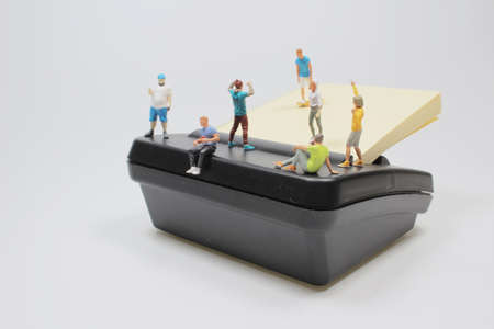 the mini figure play the Skateboard on memo pad