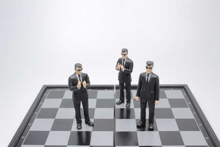 a mini business Man On A Chess Boardの写真素材