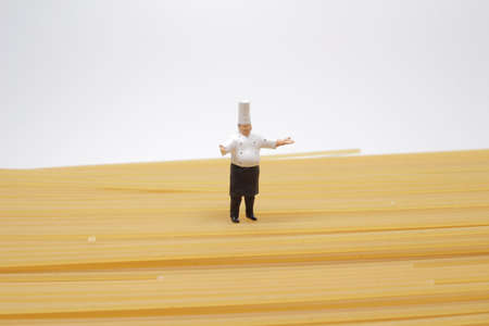 a Pasta and a mini chef figureの写真素材