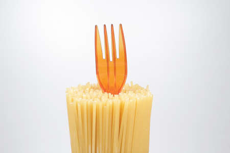 the pasta with the fork with whit backgroundの写真素材