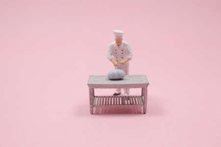 the mini Chef during cooking and workingの写真素材
