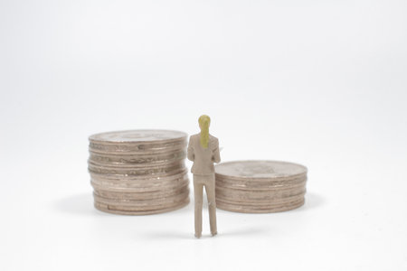 the mini of Businesswoman with coins in forex conceptの写真素材