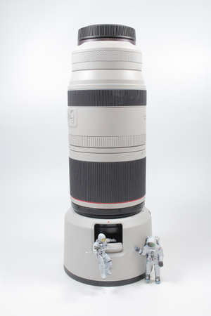 the figure of Astronaut with the telephoto lens