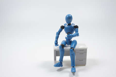 the figure sit on the desk,  business concept