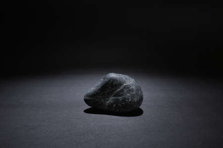 Black rock background. Dark gray stone texture.の写真素材