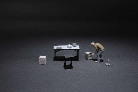 the mini figure at the work placeの写真素材