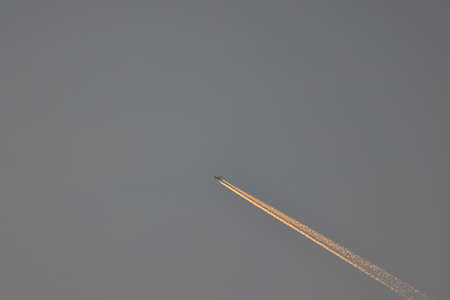 the double track in the sky from a jet plane