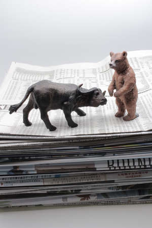 the Stock market report with bull and bearの写真素材