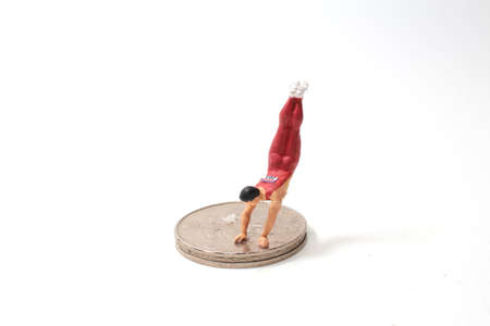 the fun figure man gymnasts on coins