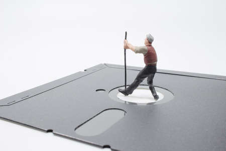 a mini of technician on floppy diskの写真素材