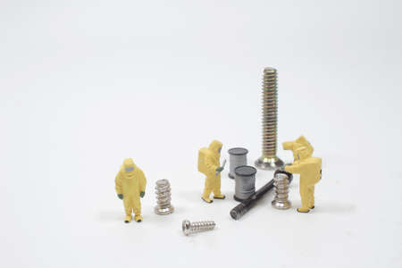 Worker pick up the screw. Image use for background business concept