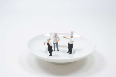 the group of figures of chefs on saucerの写真素材