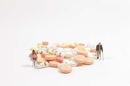 an injury figure with the many pillsの写真素材