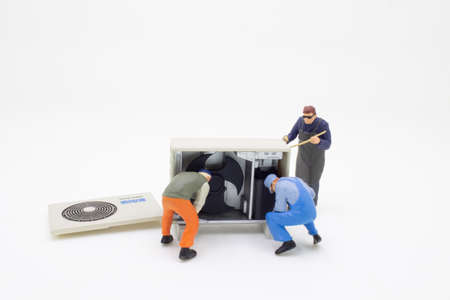 the mini figure Electrician operator inspect and checking heating ventilatedの写真素材