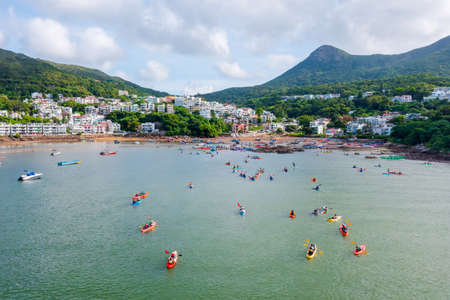 4 May 2022 the rowers on canoe floating to shore at sai kungの写真素材