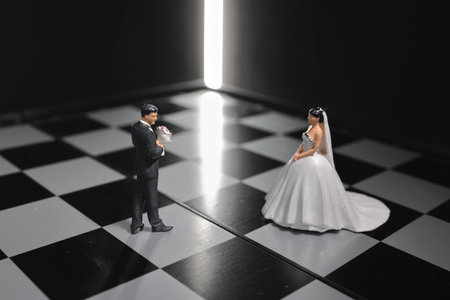 figure of Bride and groom on chess boardの写真素材