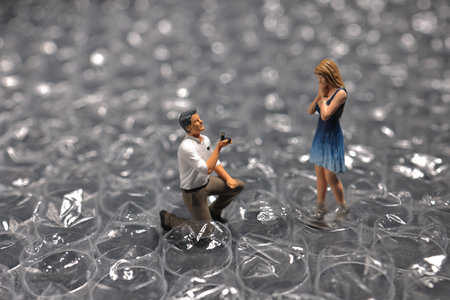 man gave his girlfriend a ring and asked to marry herの写真素材