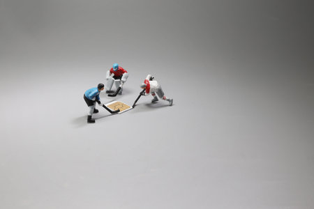 mini fiure playing ice hockey with sim cardの写真素材