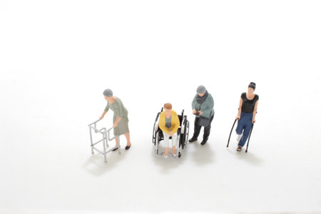a special needs with prosthesis, crutches, stick, in wheelchairの写真素材